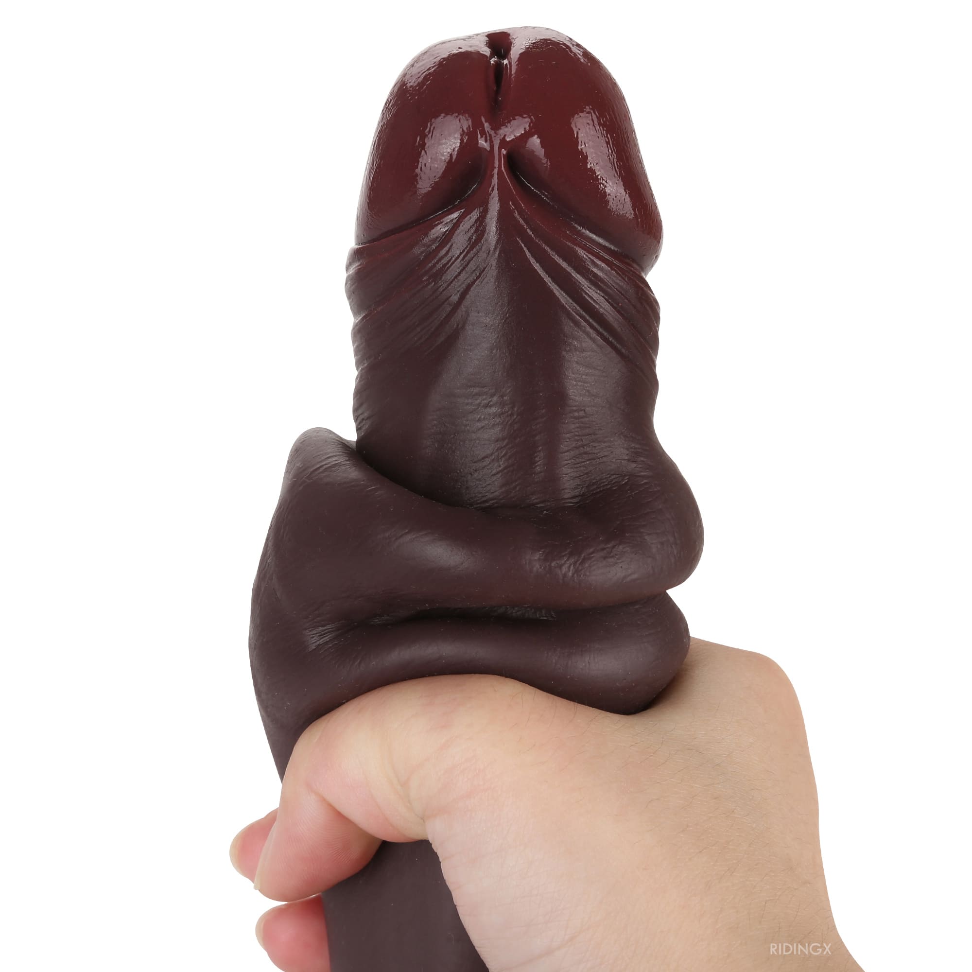 RIDINGX 9 inch black soft silicone realistic dildo close up detail shot highlighting the realistic glans